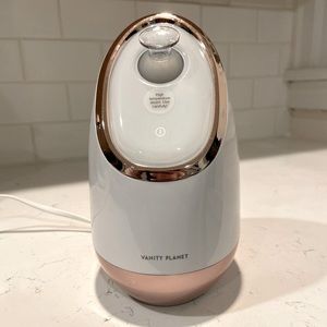 Vanity Planet Aira Facial Steamer in Rose Gold. Used one time.